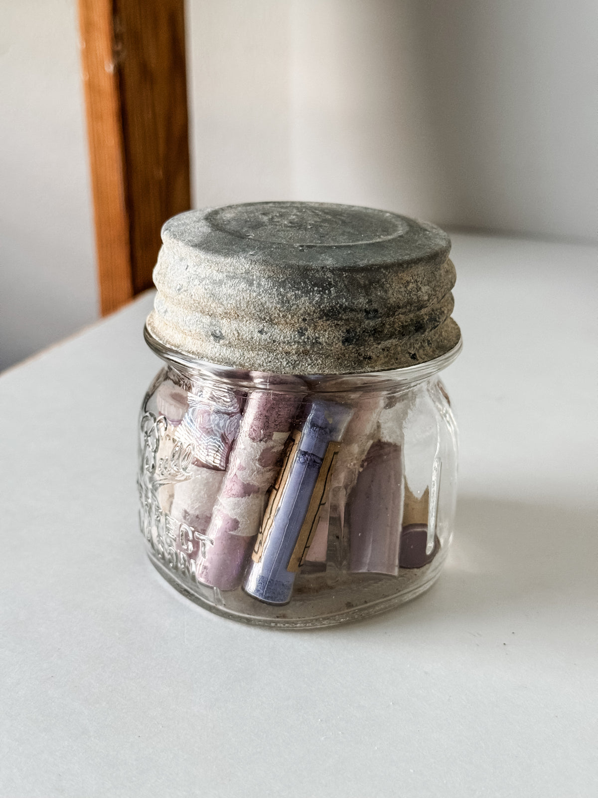 Glass Vials Of Vintage And Antique Paint Powder Pigments In A Vintage Jar With Zinc Lid