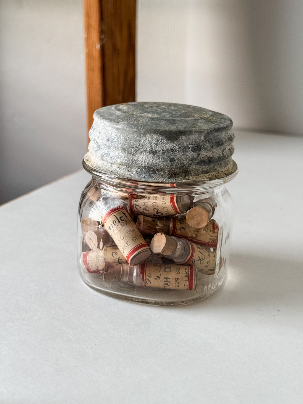 Glass Vials Of Vintage And Antique Paint Powder Pigments In A Vintage Jar With Zinc Lid