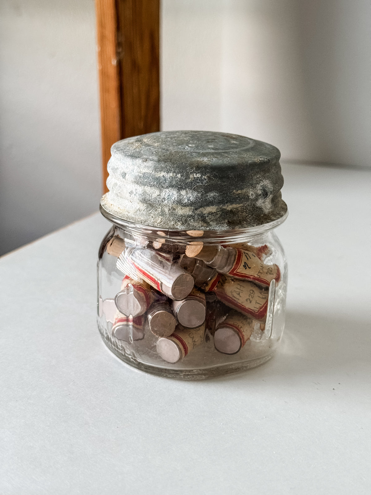 Glass Vials Of Vintage And Antique Paint Powder Pigments In A Vintage Jar With Zinc Lid