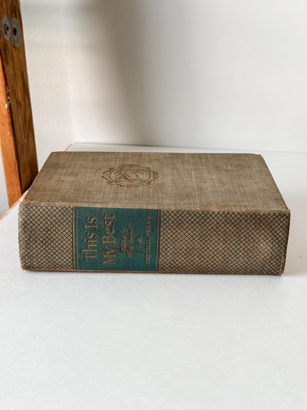 Vintage Neutral Book With Green Graphics On The Spine