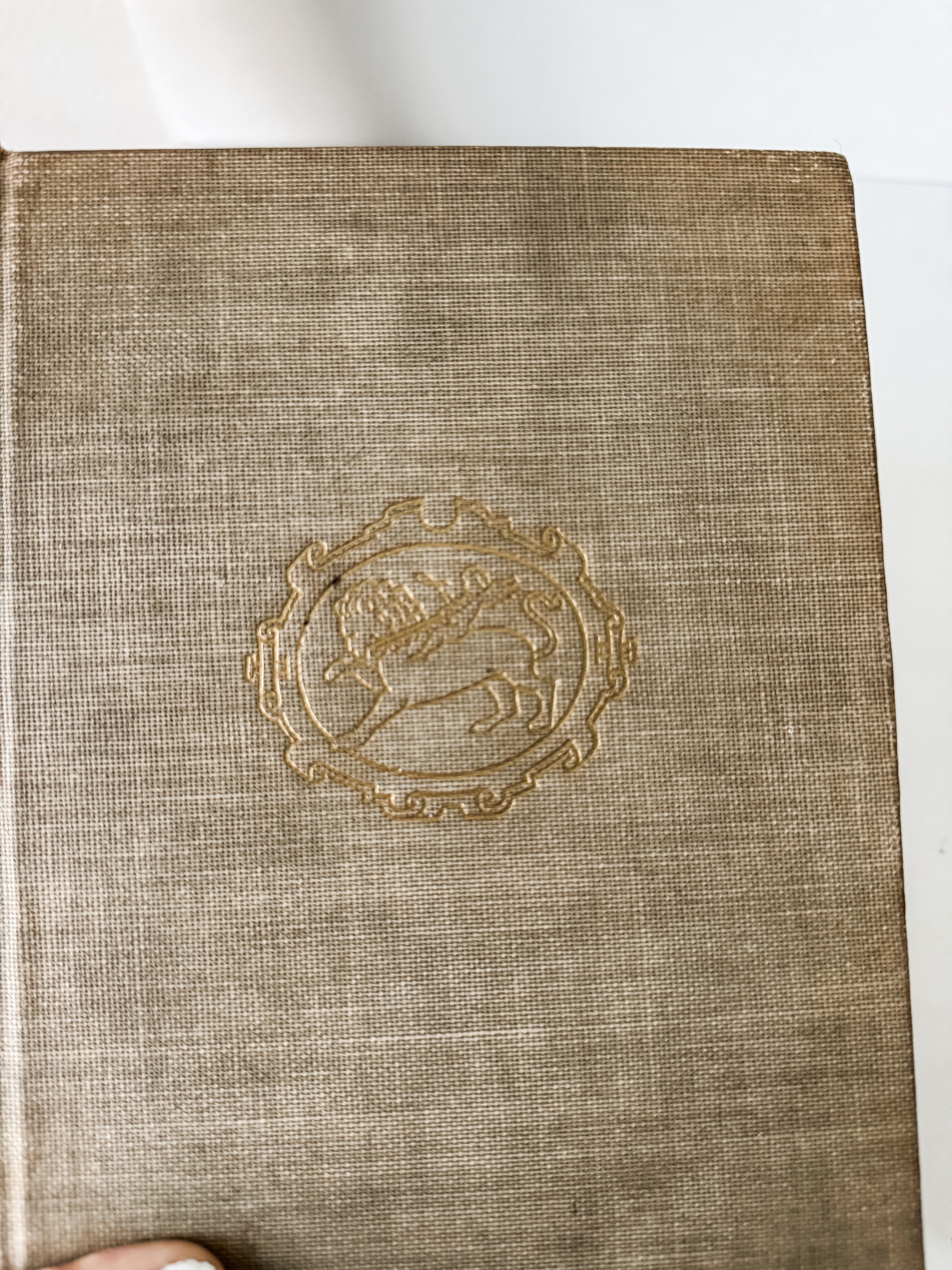 Vintage Neutral Book With Green Graphics On The Spine