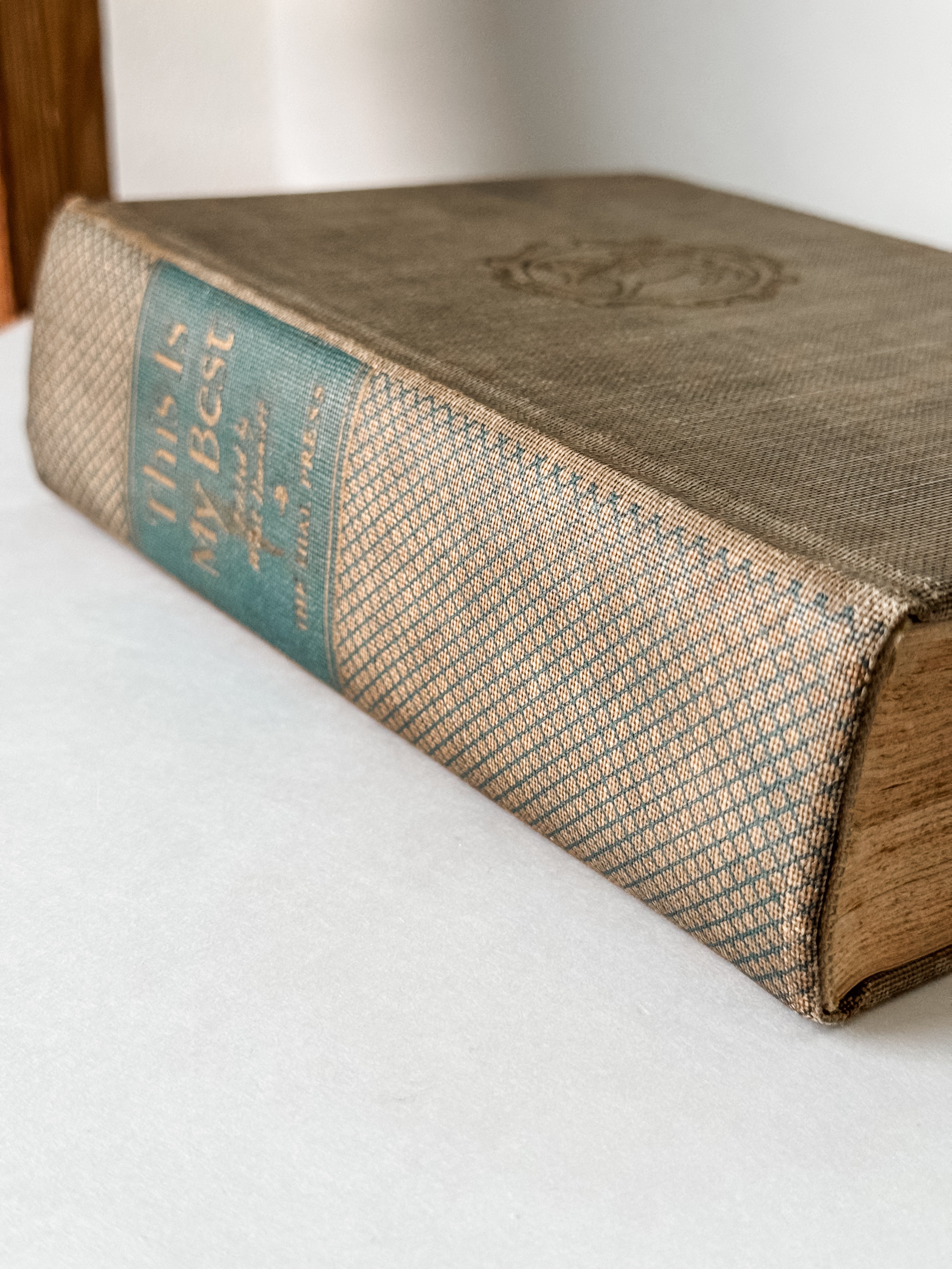 Vintage Neutral Book With Green Graphics On The Spine