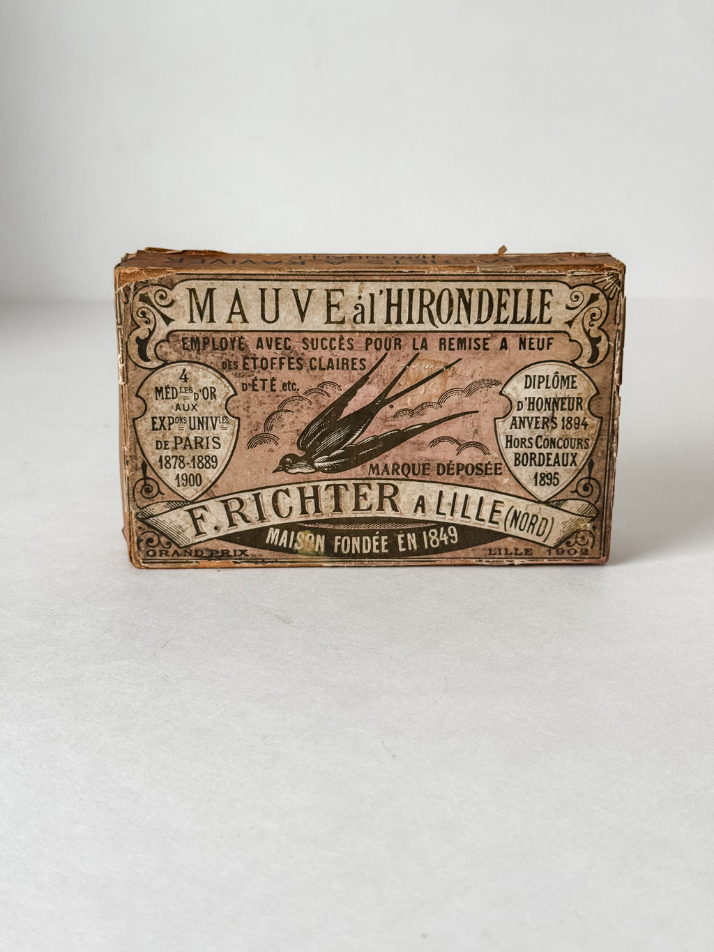 Antique French Cardboard Box Of Mauve Colored Fabric Dyes