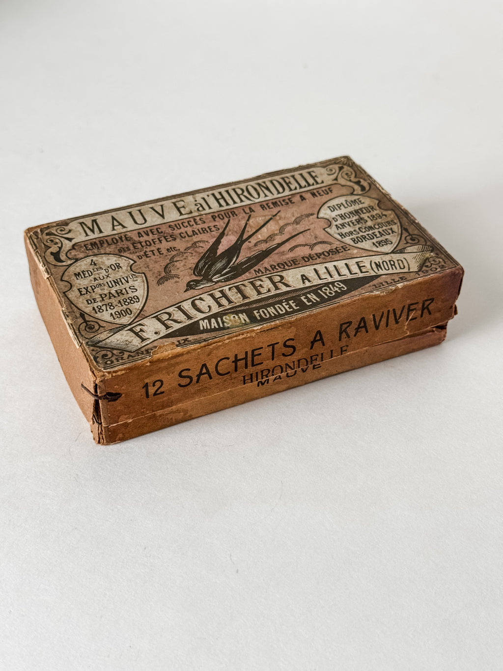 Antique French Cardboard Box Of Mauve Colored Fabric Dyes