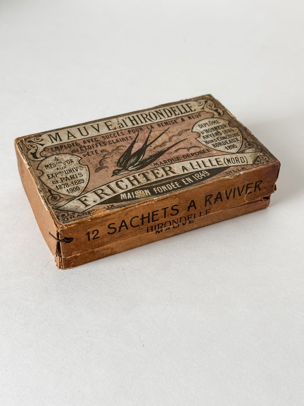 Antique French Cardboard Box Of Mauve Colored Fabric Dyes