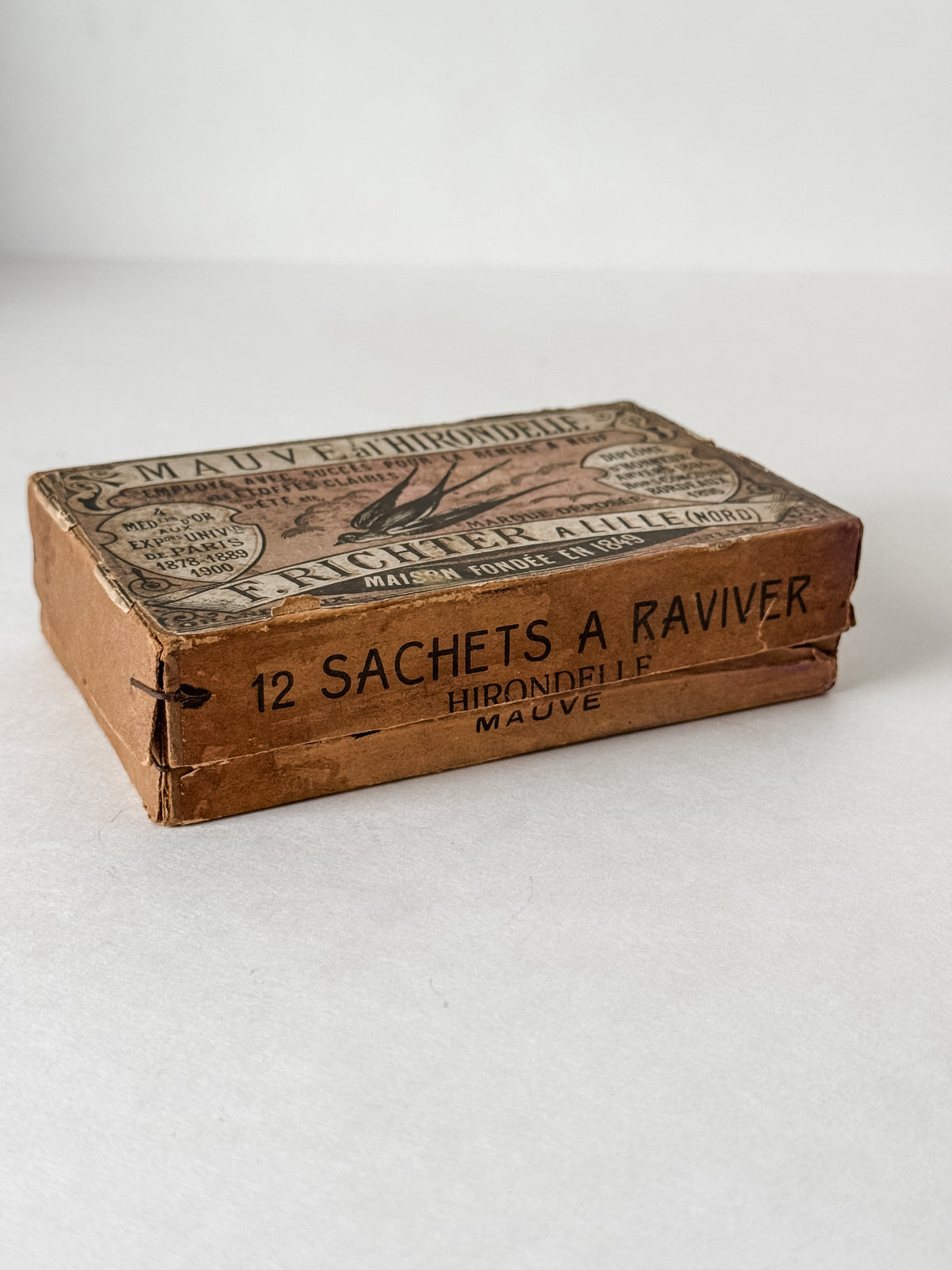 Antique French Cardboard Box Of Mauve Colored Fabric Dyes