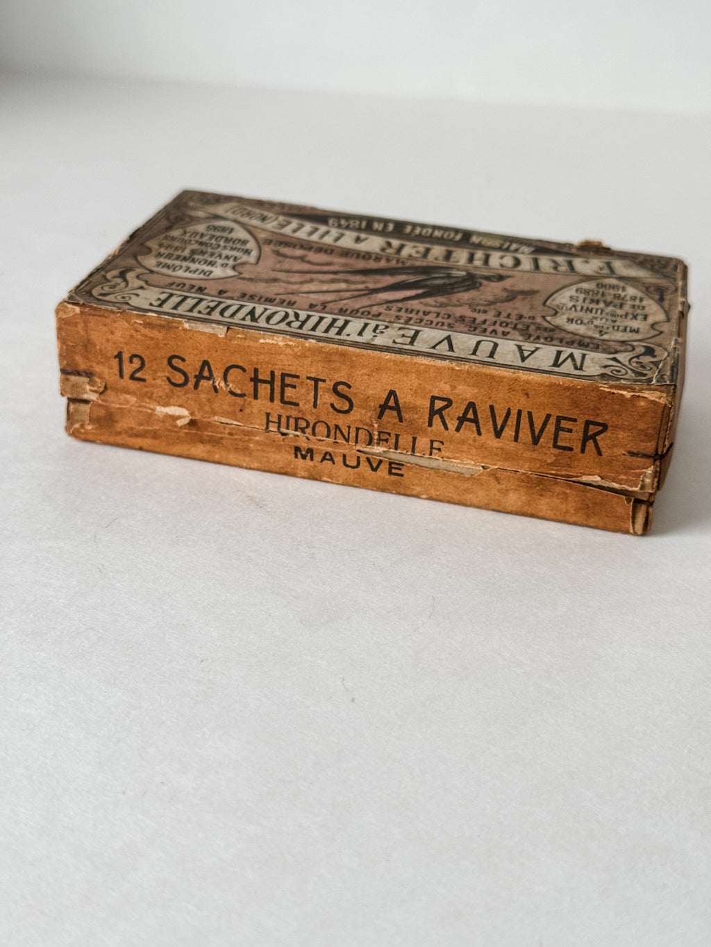 Antique French Cardboard Box Of Mauve Colored Fabric Dyes