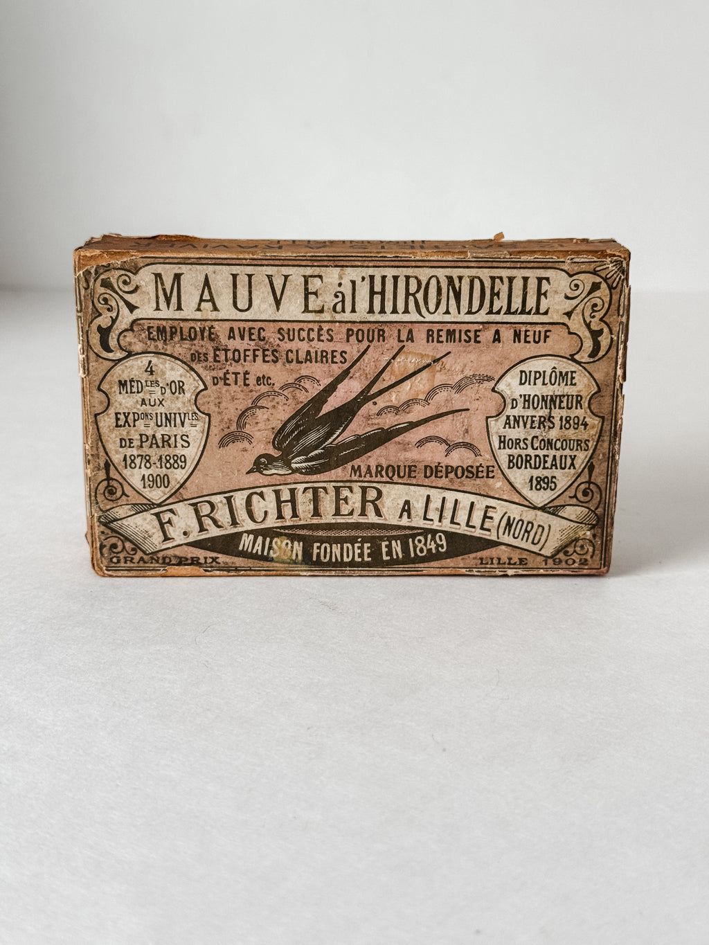 Antique French Cardboard Box Of Mauve Colored Fabric Dyes