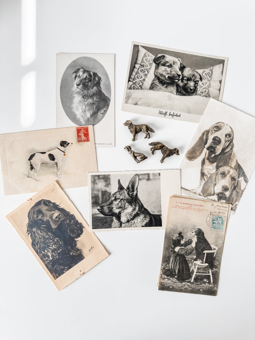 Collection Of Dog Themed Vintage And Antique Postcards And Brass Figures
