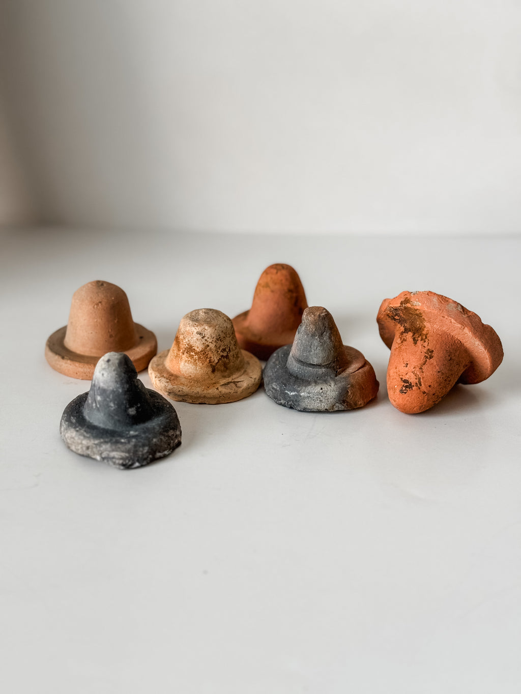 Set Of Six Handmade Antique Terracotta Bottle Stops